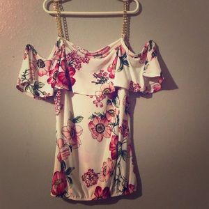 Pink flowers and gold chain has straps